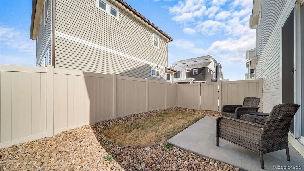 Exterior details and patio area of a home in , Bennett (Image 24).