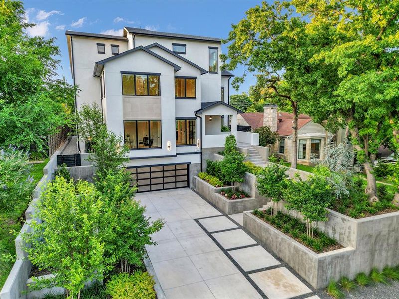 Front exterior of a new home in , Dallas, TX, highlighting curb appeal (Image 1). Front exterior of a new home in , Dallas, TX, highlighting curb appeal (Image 1).