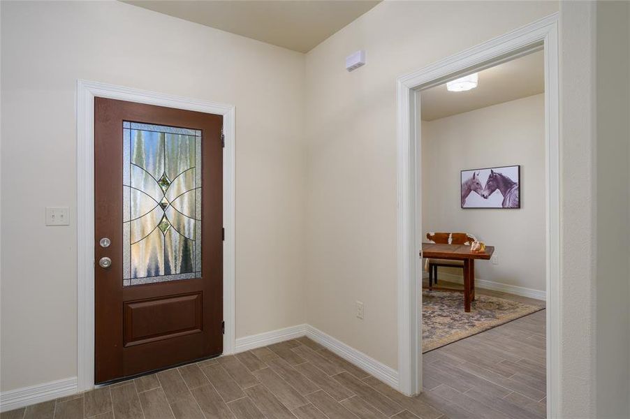 Foyer featuring light wood-type flooring