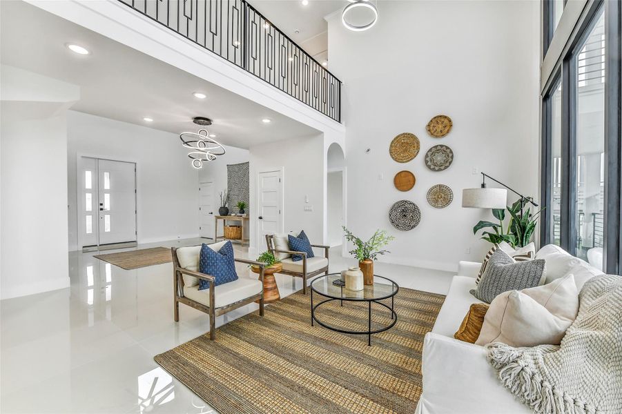 Open, airy and made for connection. Soaring ceilings and a natural flow between the living, dining and kitchen areas allow gatherings to feel spacious without losing warmth. Open, airy and made for connection. Soaring ceilings and a natural flow between the living, dining and kitchen areas allow gatherings to feel spacious without losing warmth.