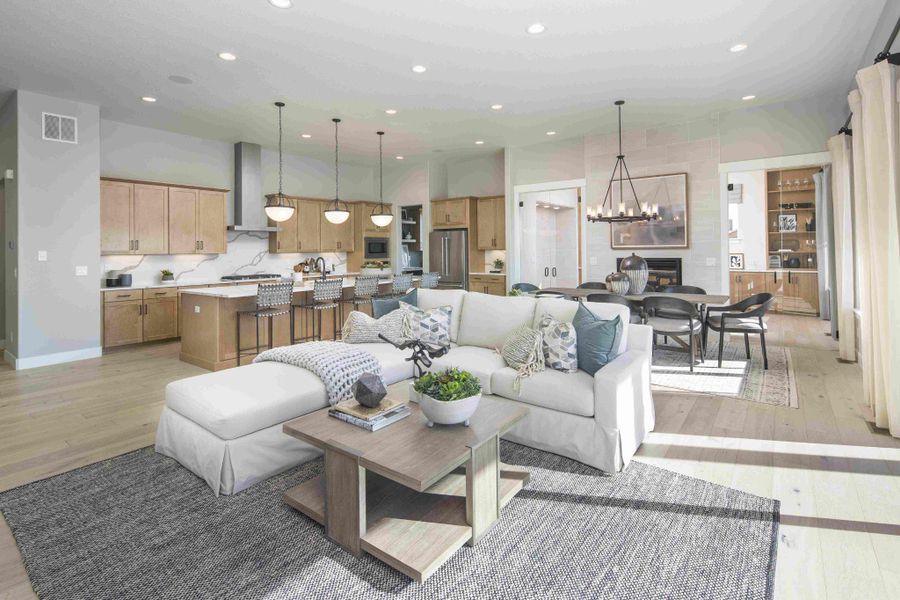 Plan C652 Living/Kitchen/Dining Photo by American Legend Homes