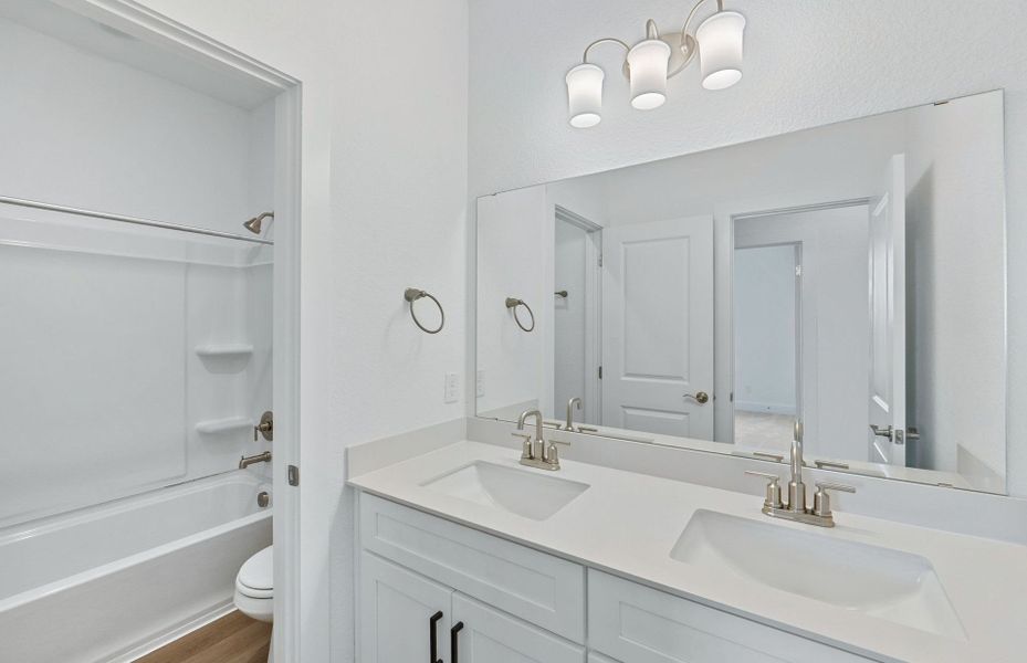 Furnished interior view inside a new home in Northpoint at Old Settlers, Round Rock (Image 13).