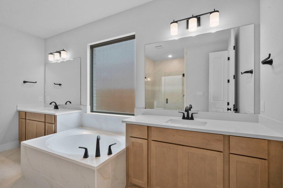 Primary Bath retreat with dual vanities & garden tub Primary Bath retreat with dual vanities & garden tub