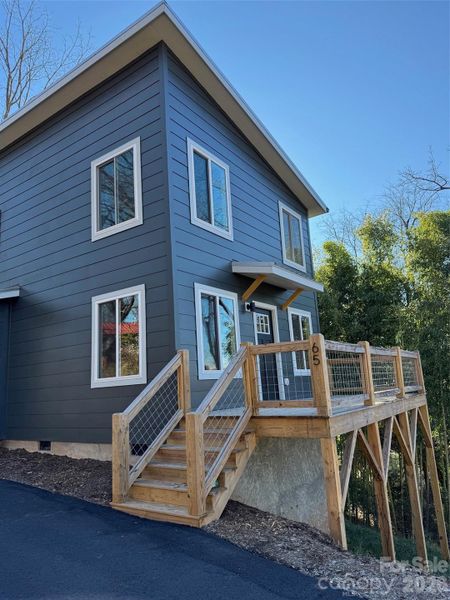 Main Entrance, front door with awning, front deck. Main Entrance, front door with awning, front deck.