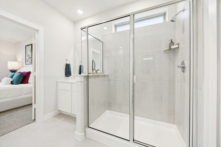 Primary Bathroom in a Belmont Magnolia Model Home in Aubrey TX by Trophy Signature Homes