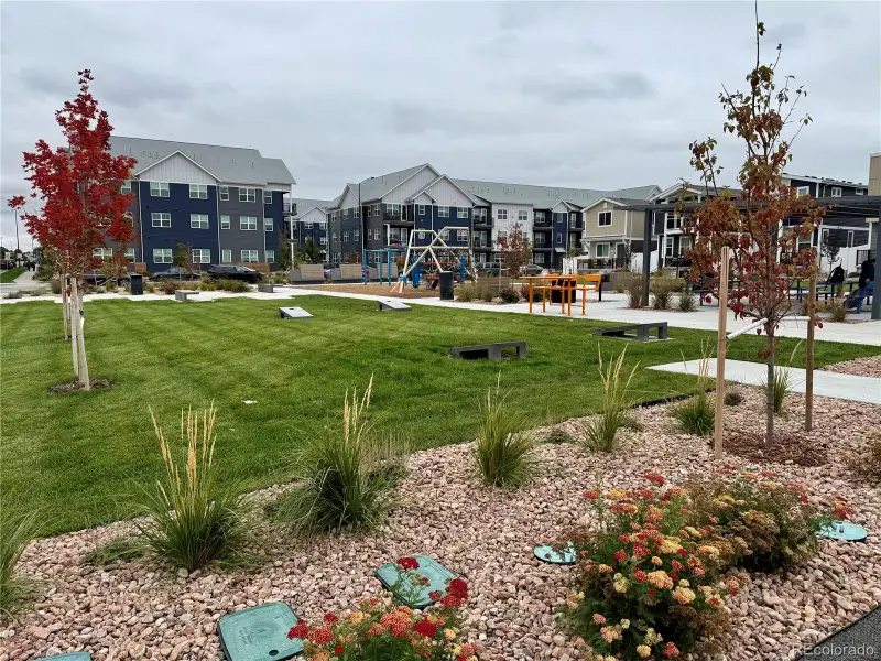Picnic gazebo with corn hole game