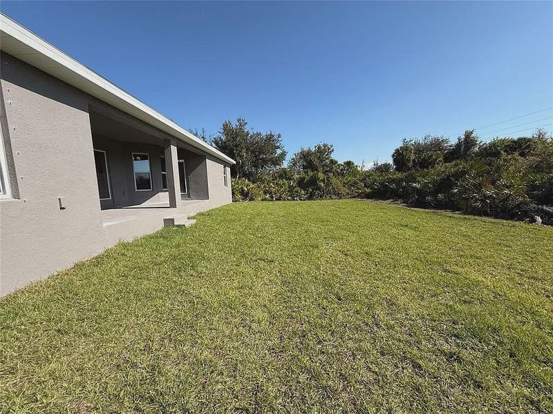 Exterior details and patio area of a home in South Gulf Cove, Port Charlotte (Image 17).