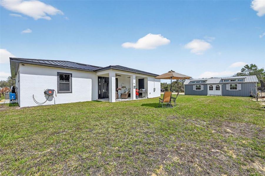 Exterior details and patio area of a home in , Lake Placid (Image 24).