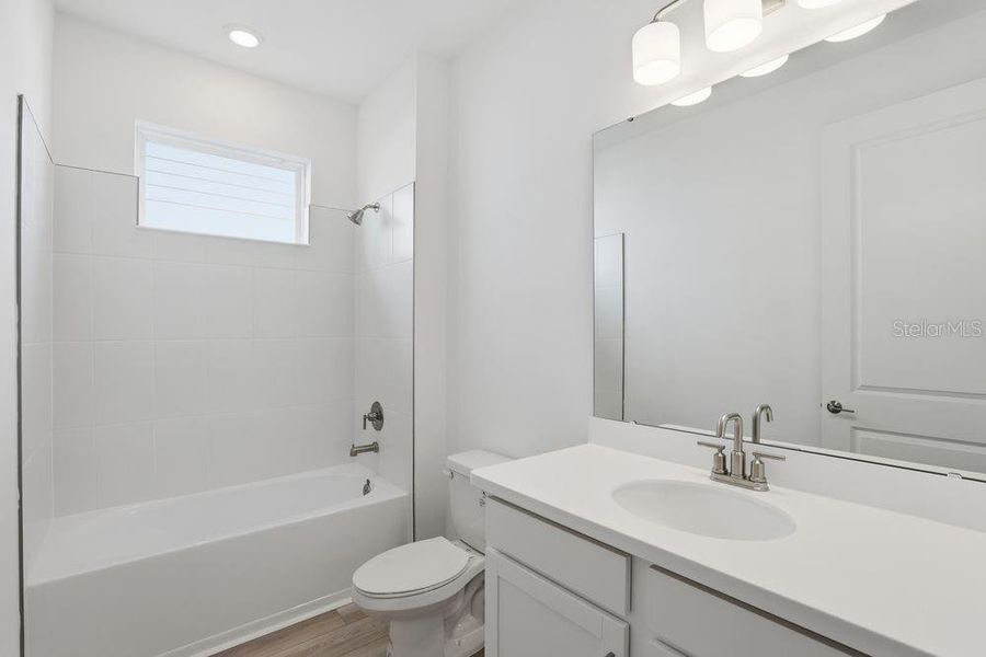 Furnished interior view inside a new home in Center Lake Ranch Community Group Page, St. Cloud (Image 10).