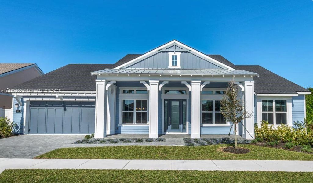 Front exterior of a new home in , Ormond Beach, FL, highlighting curb appeal (Image 2).