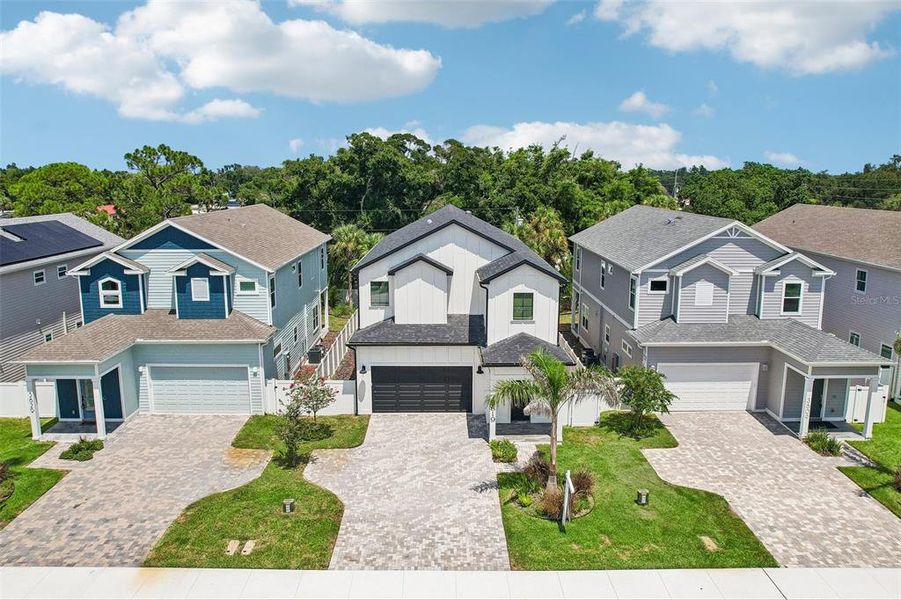 Front exterior of a new home in , St. Petersburg, FL, highlighting curb appeal (Image 27). Front exterior of a new home in , St. Petersburg, FL, highlighting curb appeal (Image 27).