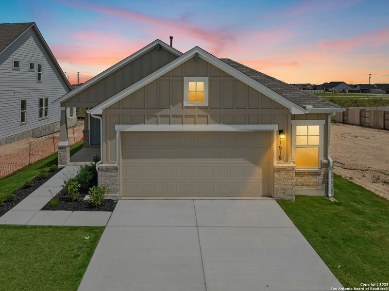 Front exterior of a new home in Willowbrook, New Braunfels, TX, highlighting curb appeal (Image 15).