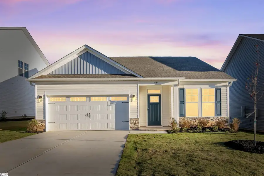 Front exterior of a new home in Halton Oaks, Spartanburg, SC, highlighting curb appeal (Image 1).