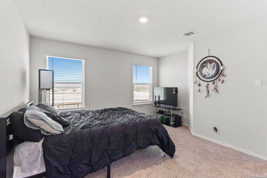 Furnished interior view inside a new home in Redbird Ranch, San Antonio (Image 17).