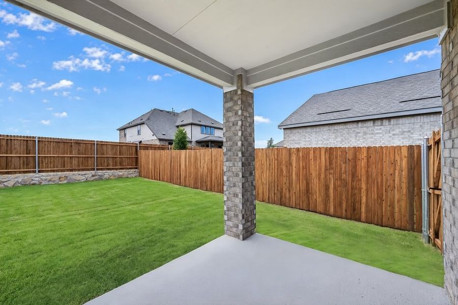 Exterior details and patio area of a home in Parks at Foster Crossing, Anna (Image 3).