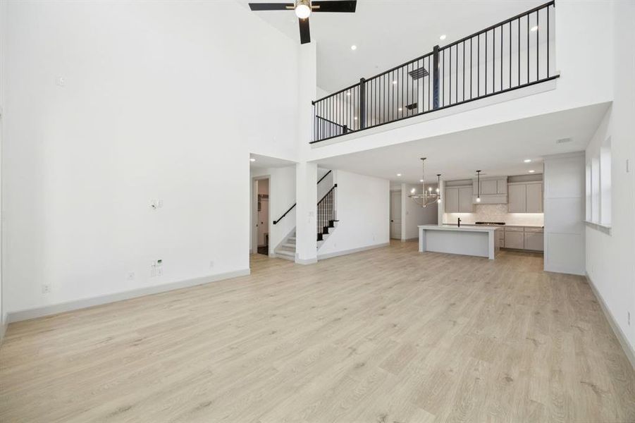 Our Versailles III plan features a game room with open railing that overlooks the family room below creating a multi-level entertainment area! Our Versailles III plan features a game room with open railing that overlooks the family room below creating a multi-level entertainment area!