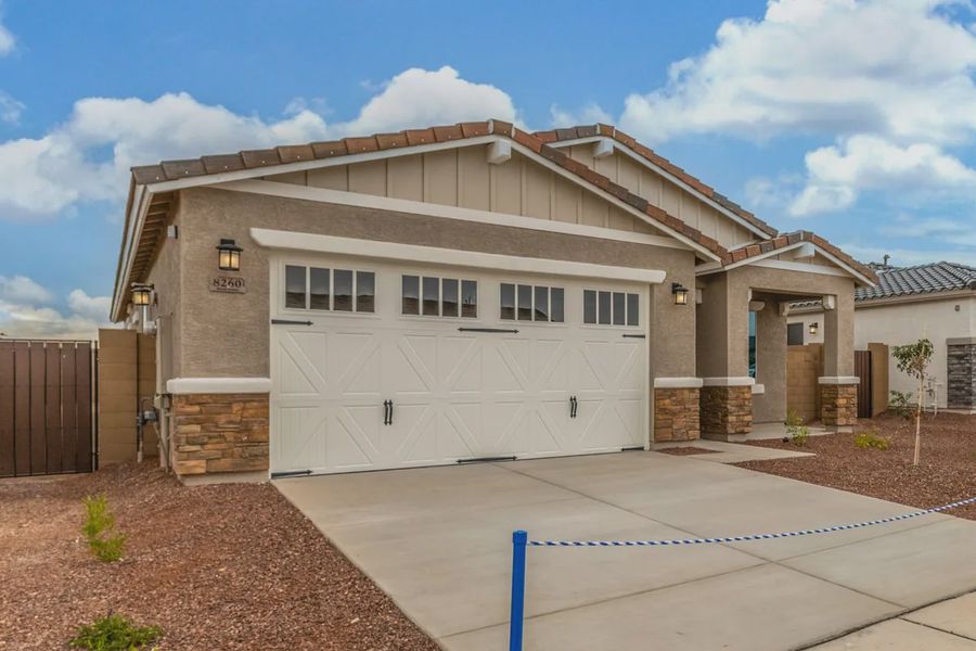 Front exterior of a new home in Avanti at Granite Vista, Waddell, AZ, highlighting curb appeal (Image 21).