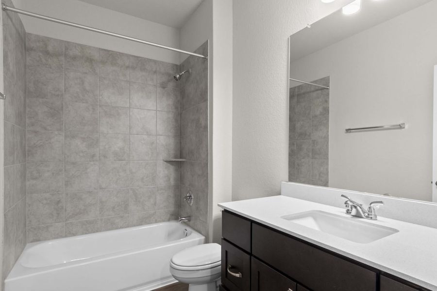 Furnished interior view inside a new home in Oaks at San Gabriel, Georgetown (Image 10).