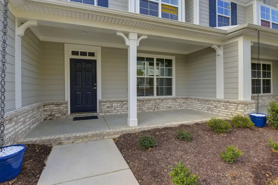 Exterior details and patio area of a home in Lake Carolina Townhomes, Columbia (Image 3).