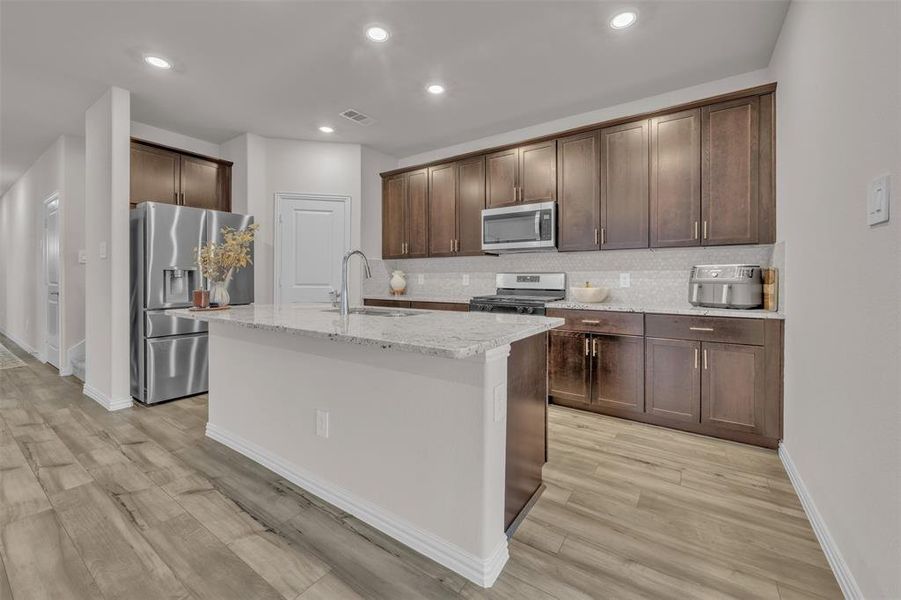 Furnished interior view inside a new home in Briarwood Hills - Highland Series, Forney (Image 8). Furnished interior view inside a new home in Briarwood Hills - Highland Series, Forney (Image 8).