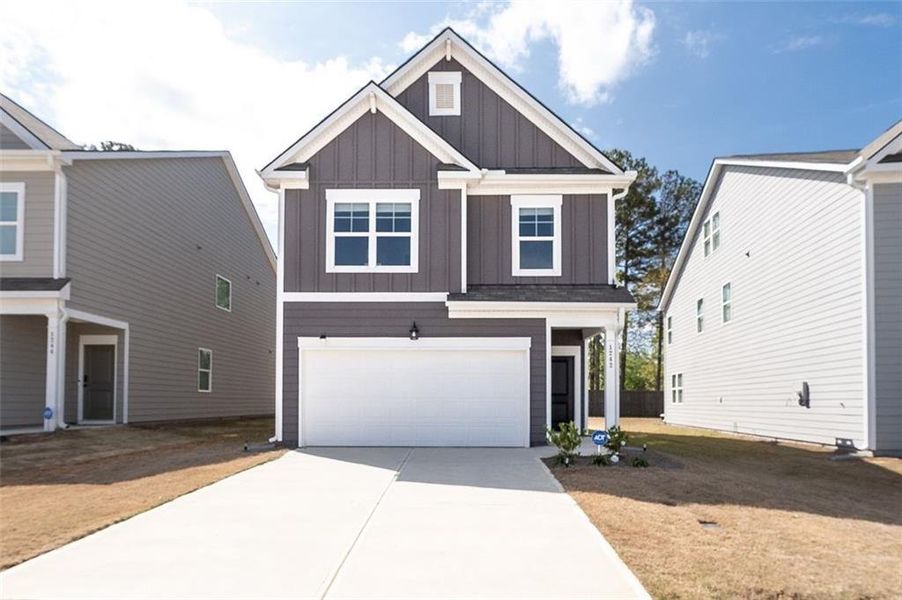 Front exterior of a new home in Walden Park - The Retreat, Jonesboro, GA, highlighting curb appeal (Image 25).