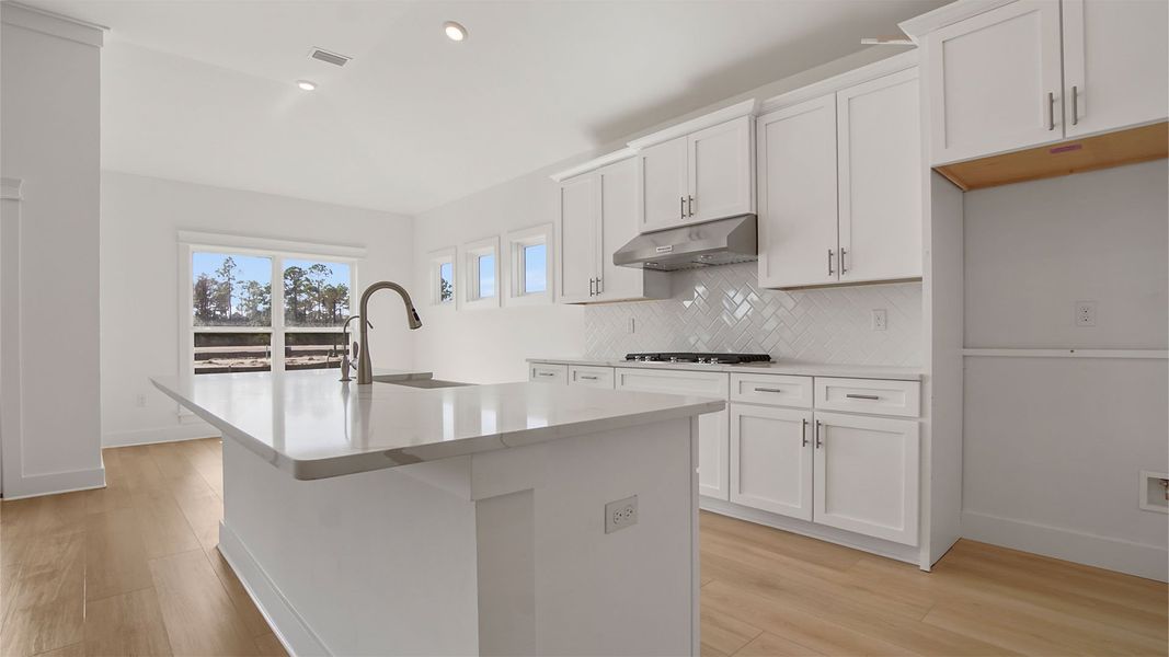 Representative furnished interior of a home built from the Magnolia by D.R. Horton in Breakfast Point East Phase II, Panama City Beach (Image 9).