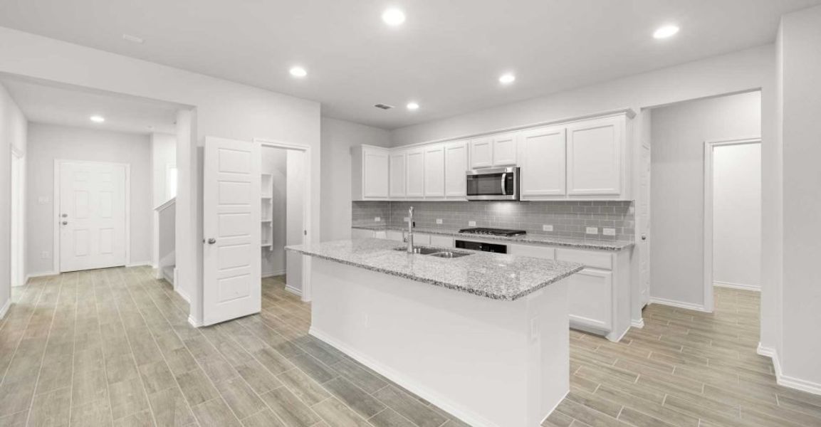 Representative exterior photo of a completed home built from the Dozier by Impression Homes in Redden Farms, Midlothian, TX (Image 8). Representative exterior photo of a completed home built from the Dozier by Impression Homes in Redden Farms, Midlothian, TX (Image 8).