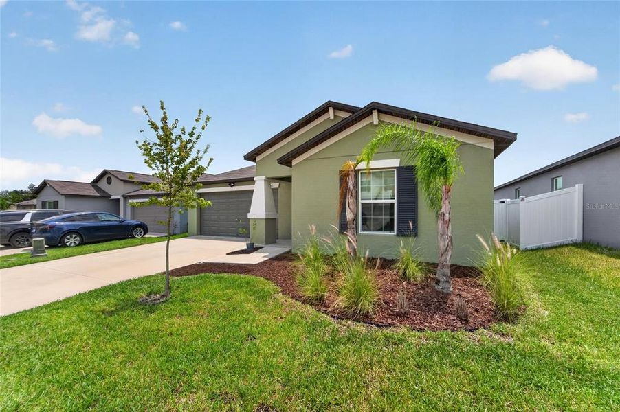 Front exterior of a new home in , Bartow, FL, highlighting curb appeal (Image 26).