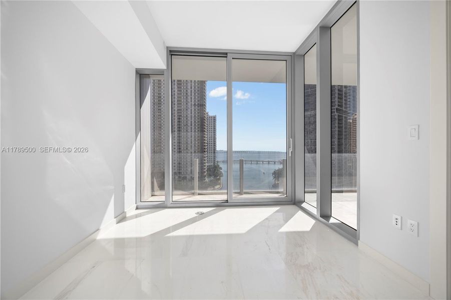 Spacious, unfurnished interior of a new home in Aston Martin Residences, Miami (Image 22).