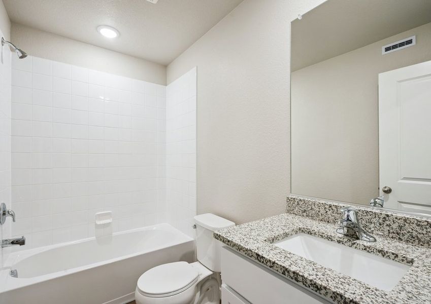 The secondary bathroom has a tub/shower combo.