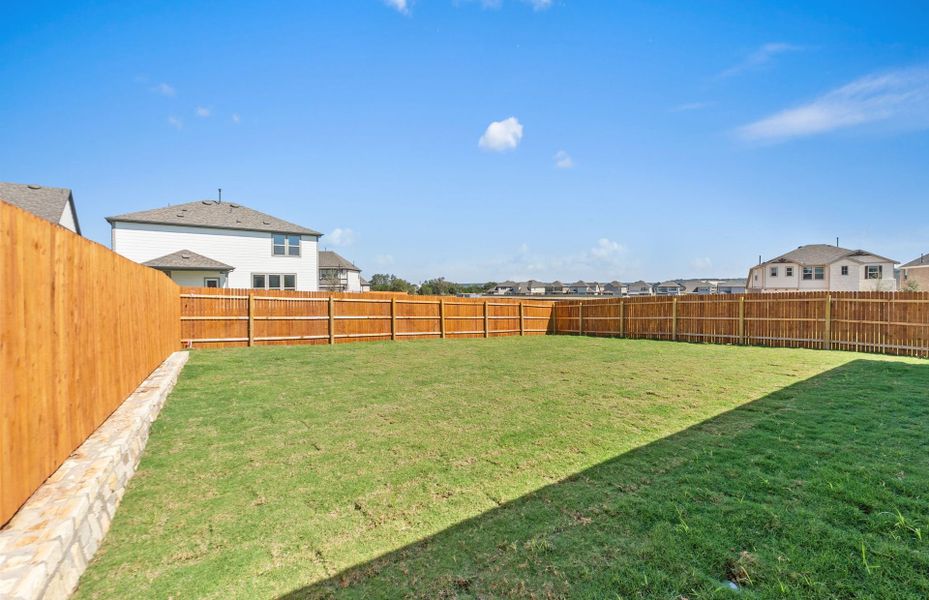 Exterior details and patio area of a home in Saddleback at Santa Rita Ranch, Liberty Hill (Image 22). Exterior details and patio area of a home in Saddleback at Santa Rita Ranch, Liberty Hill (Image 22).