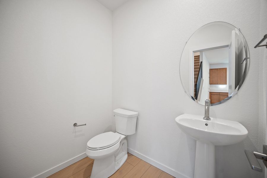 Furnished interior view inside a new home in The Commons at Victory Ridge, Colorado Springs (Image 27).