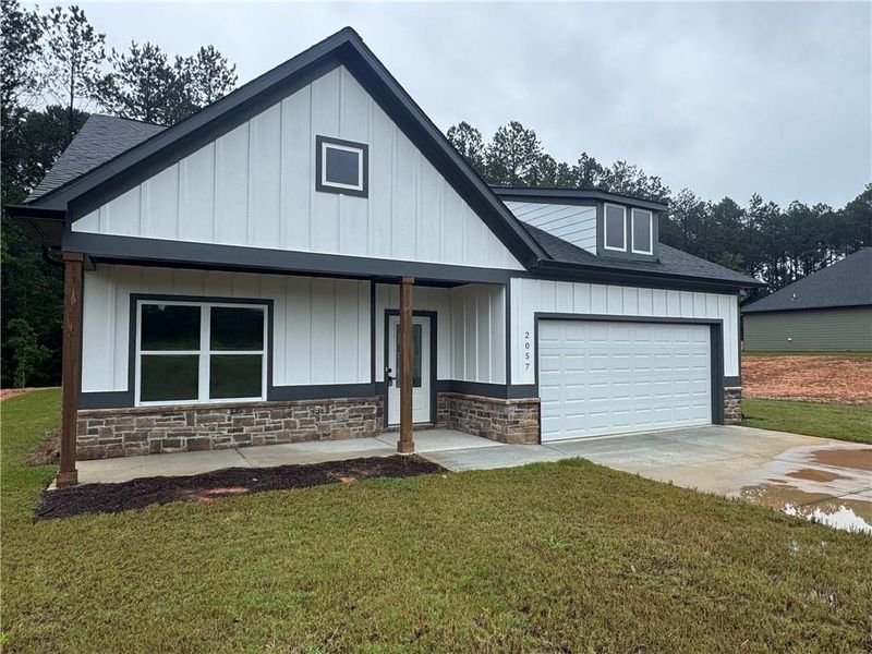 Front exterior of a new home in , Toccoa, GA, highlighting curb appeal (Image 1). Front exterior of a new home in , Toccoa, GA, highlighting curb appeal (Image 1).