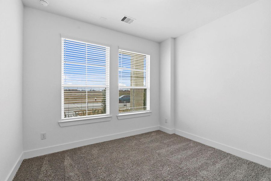 Spacious, unfurnished interior of a new home in Meridiana, Manvel (Image 26).