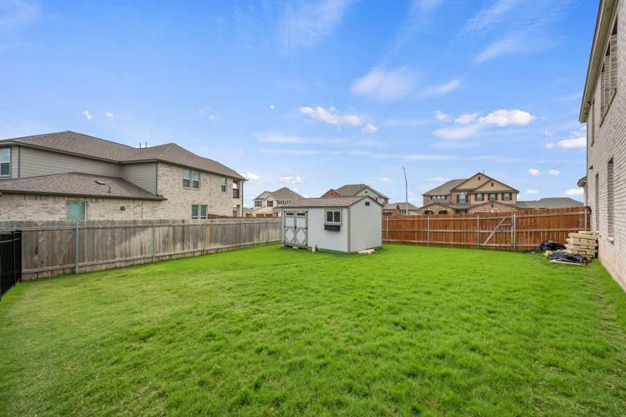 Exterior details and patio area of a home in , Round Rock (Image 20).
