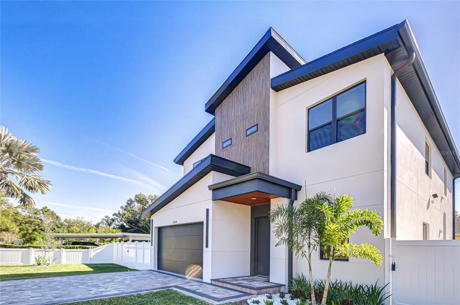 Front exterior of a new home in , Tampa, FL, highlighting curb appeal (Image 30).