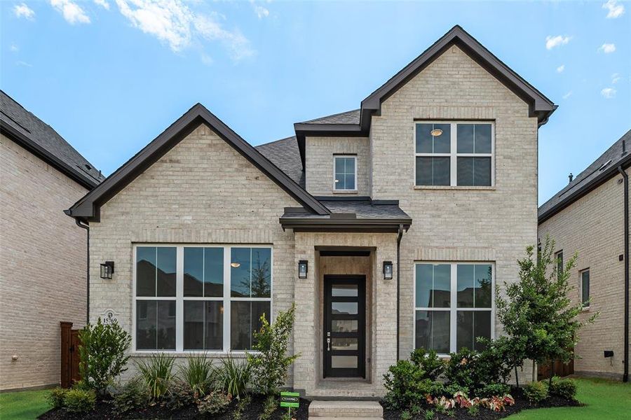 Front exterior of a new home in The Grove Frisco - 40' Lots, Frisco, TX, highlighting curb appeal (Image 2).