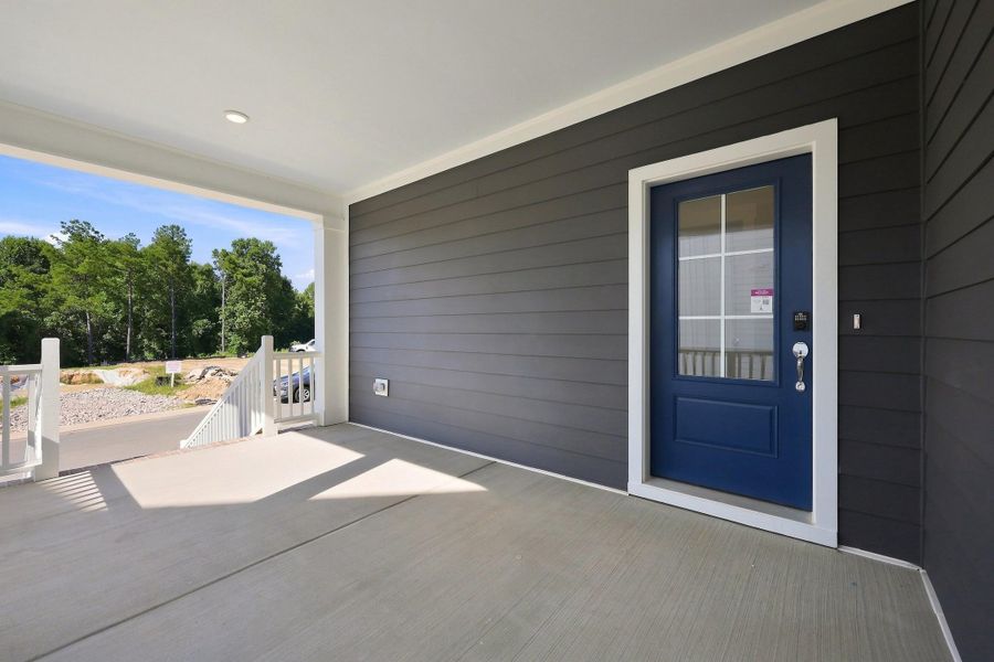 Exterior details and patio area of a home in Wendell Falls, Wendell (Image 19).