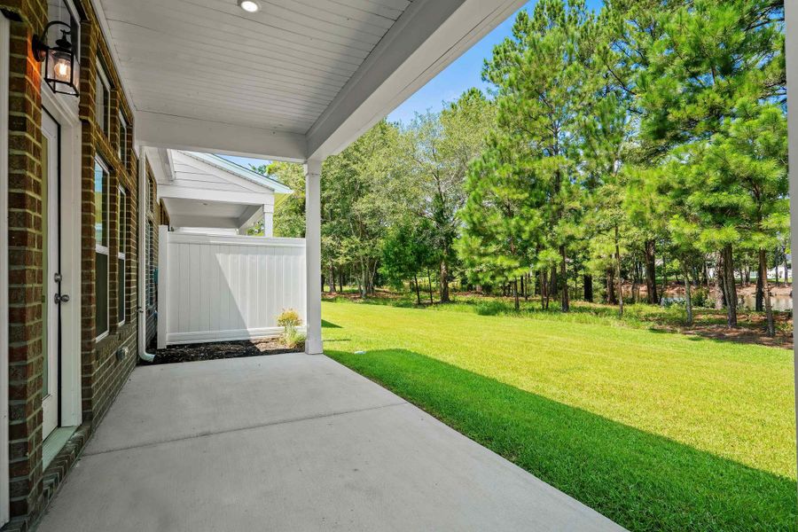 Exterior details and patio area of a home in Long Bay Golf Club, Longs (Image 22).