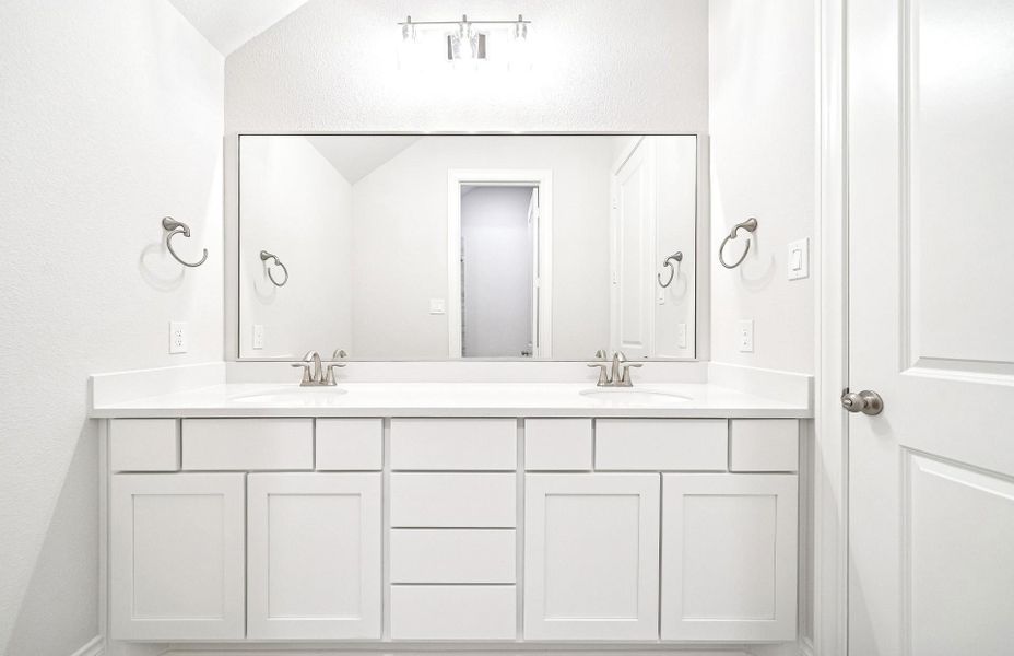 Furnished interior view inside a new home in Bridgeland 60′, Cypress (Image 12).