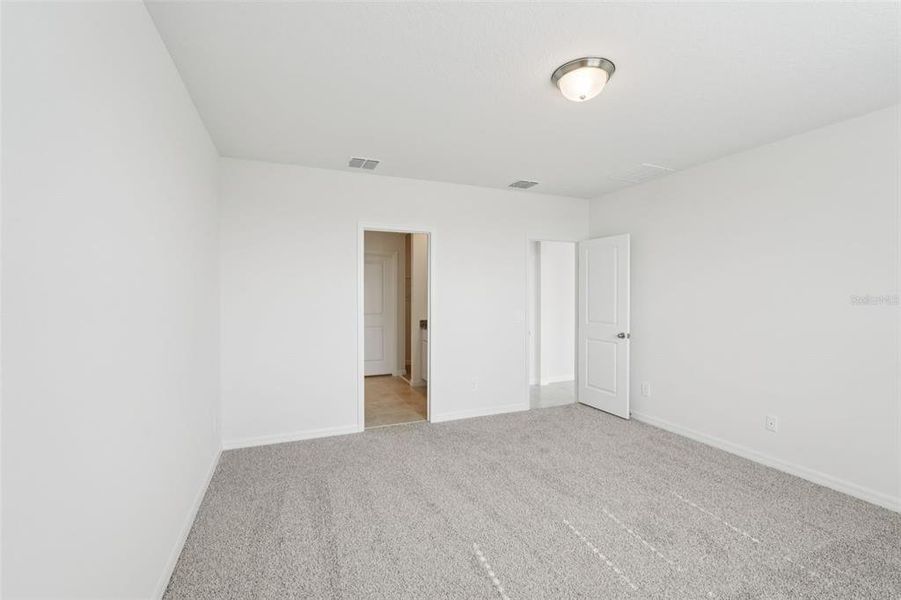 Spacious, unfurnished interior of a new home in Crosswinds - Signature Series, Haines City (Image 22).