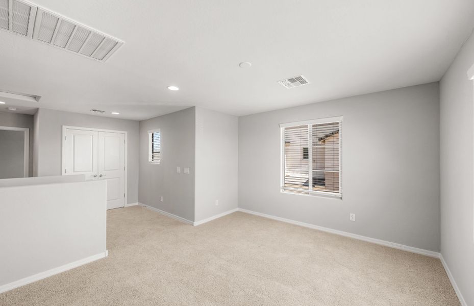 Spacious, unfurnished interior of a new home in Asante- Atrium Series, Surprise (Image 16).