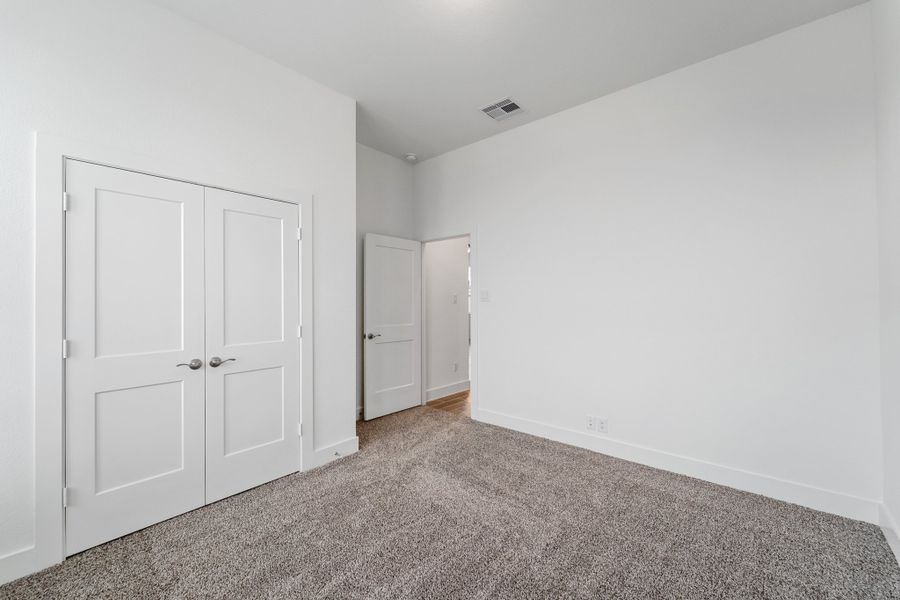 Representative unfurnished interior of a home built from the Augusta by Chesmar Homes in Riceland, Mont Belvieu (Image 18). Representative unfurnished interior of a home built from the Augusta by Chesmar Homes in Riceland, Mont Belvieu (Image 18).