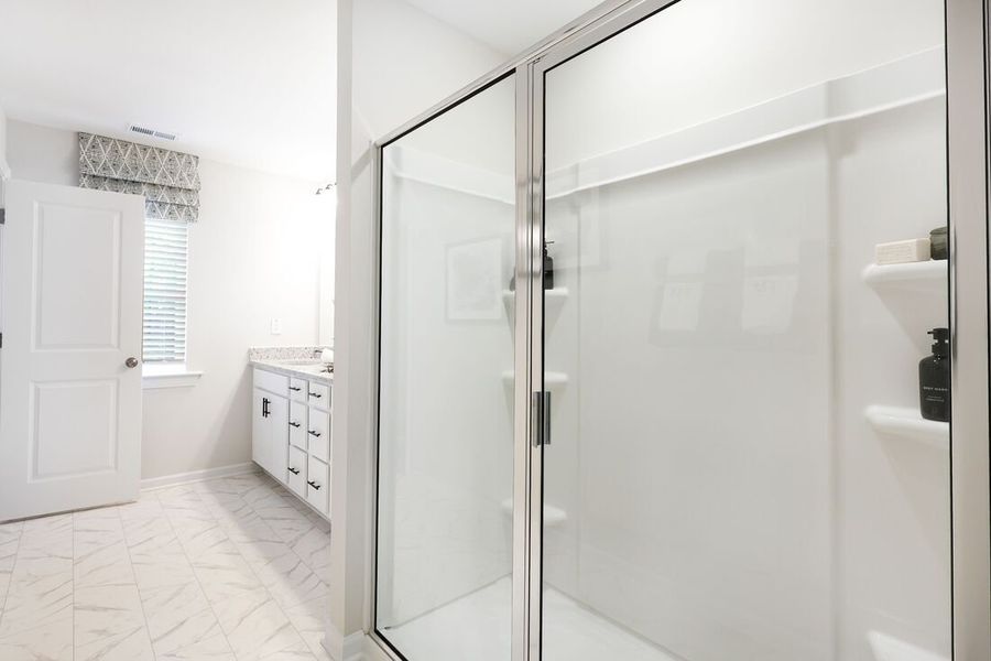 Representative furnished interior of a home built from the Cobblestone by Taylor Morrison in Buffalo Townes, Garner (Image 19).