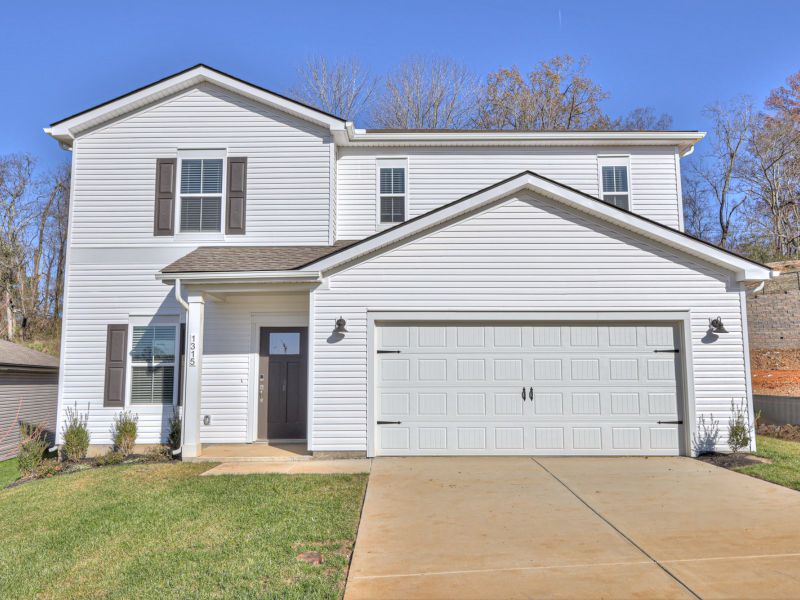 Front exterior of a new home in Wyncliff, Clarksville, TN, highlighting curb appeal (Image 1).