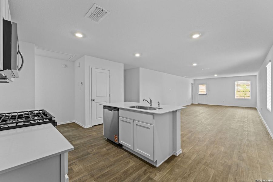 Furnished interior view inside a new home in Avenida, Converse (Image 5).