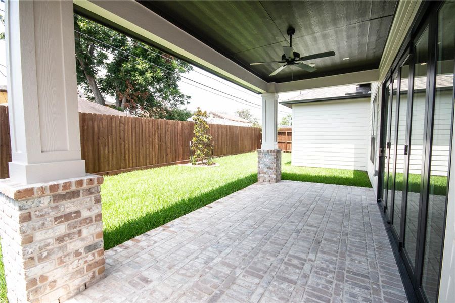 The right side of the brick patio radiates charm and character, making it an inviting feature. The right side of the brick patio radiates charm and character, making it an inviting feature.