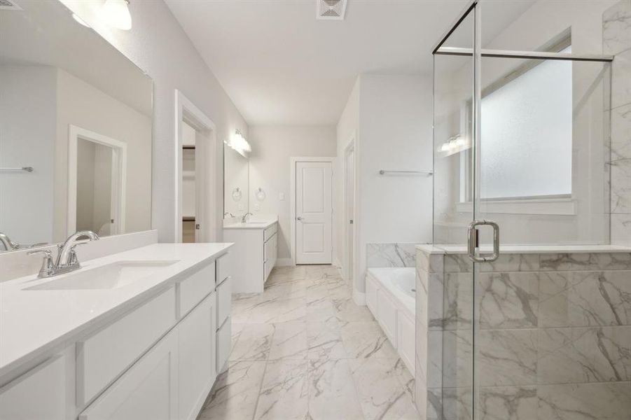 Bathroom with plus walk in shower and vanity