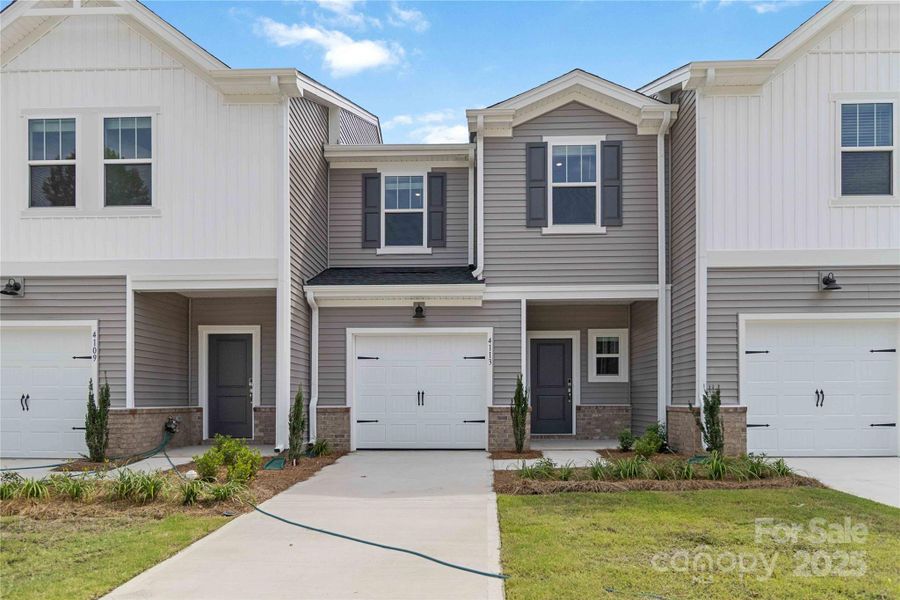 Front exterior of a new home in , Charlotte, NC, highlighting curb appeal (Image 18).