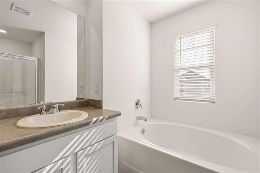 Furnished interior view inside a new home in The Preserve at Agricultural Village, Perry (Image 6).
